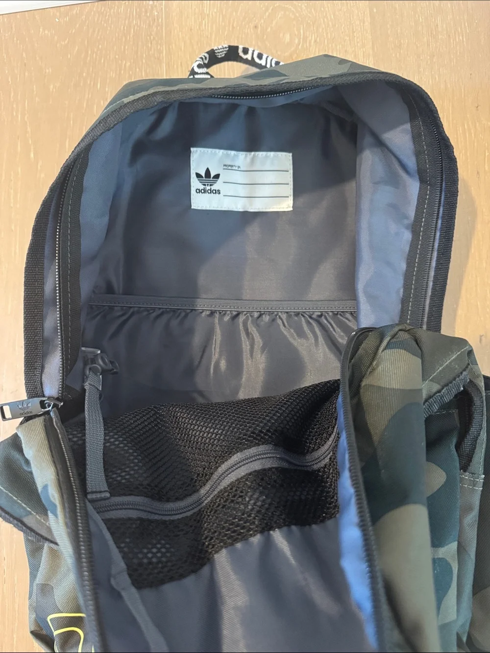 Adidas Camouflage Backpack with Neon Yellow Logo